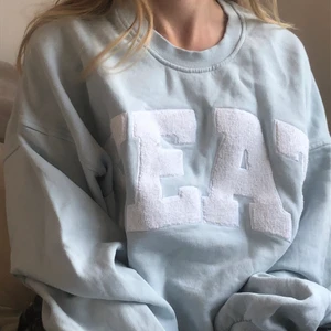 Ljusblå hoodie - En ljusblå hoodie från Zalando, som ej kommer till användning längre.