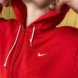 Bright red NIKE with hood 