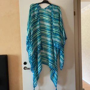 Klänning  - Den är aldrig använda 