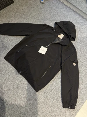 Moncler black windbreaker M - Size M, true to size. Very comfortable and brand new with tags