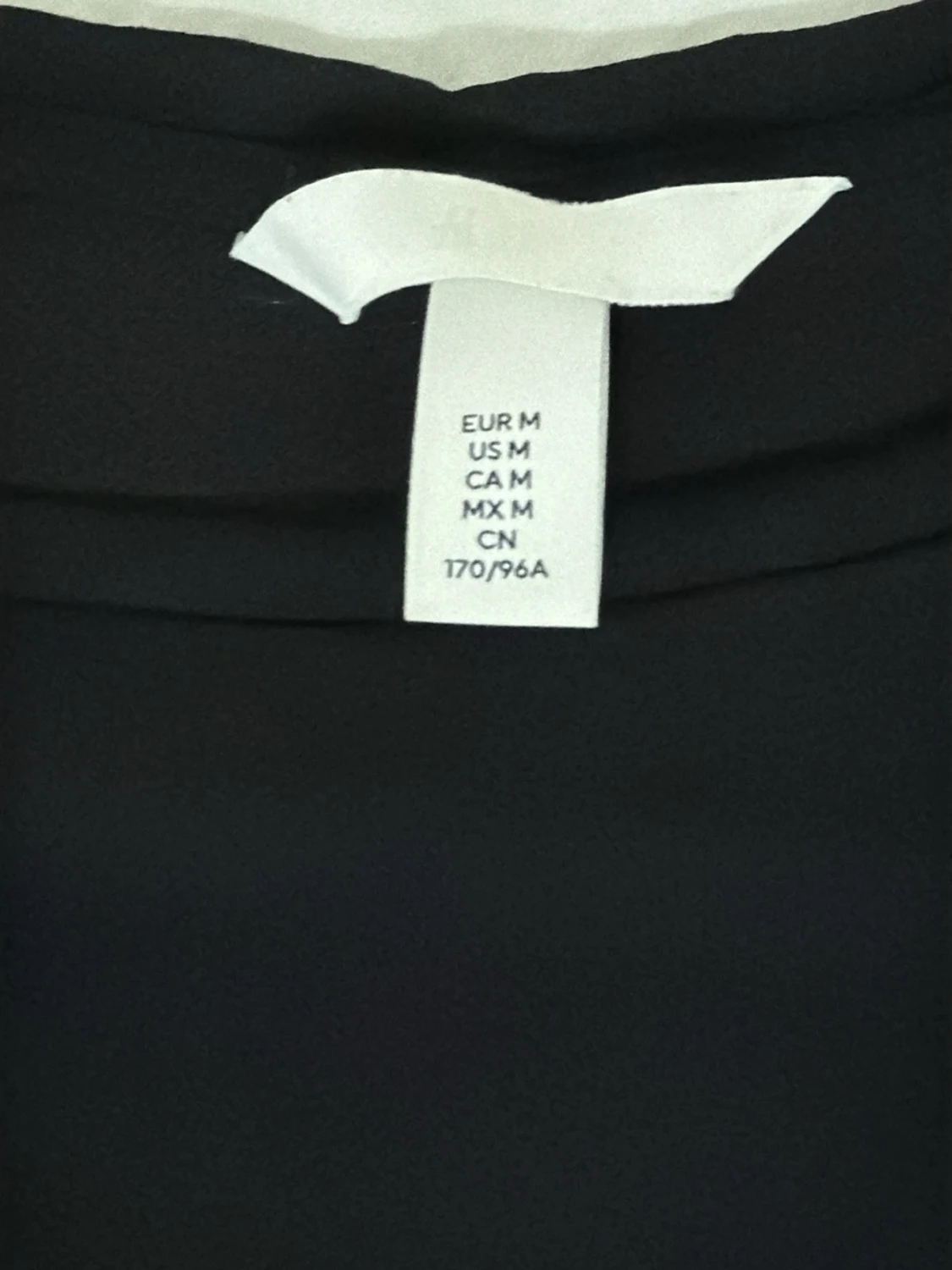 Svart topp med knyt i midjan - 1