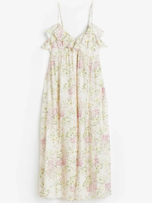 Blommig medel långklänning med volang - Super söt medel ångklänning med smala justerbara axelband och volangdetaljer vid bysten. Klänningen har ett blommigt mönster i ljusa toner av rosa, grönt och beige/vitt. Perfekt för sommarens alla tillfällen och speciellt till midsommar. Den är i ett tunt luftigt typ. Volangerna skulle behövas strykas ner om man vill ha dom lite mer nedåt. Den är ljusare i verkligheten bara att mina bilder inte är tagna i det bästa ljuset. Priset kan diskuteras!