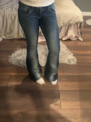Blå bootcut jeans - Använda fåtal gånger