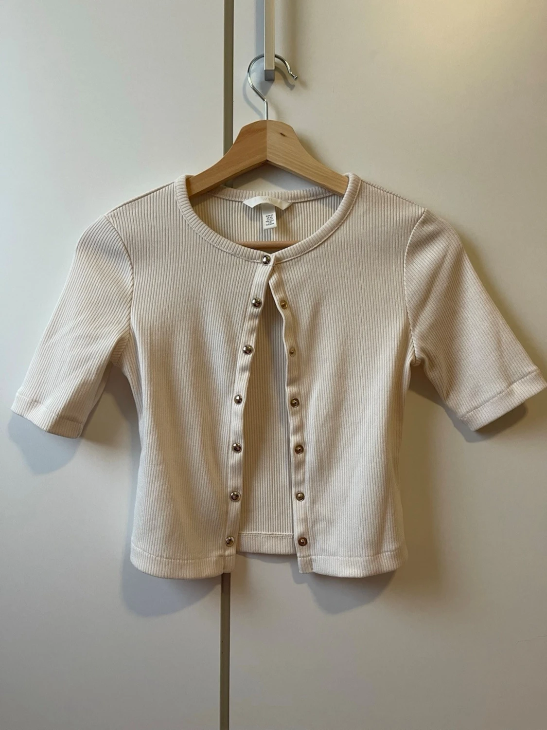 Crémevit ribbad topp med knappar H&M - 1