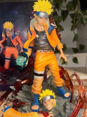 Naruto Uzumaki Figure - 23 cm - With Box - Selling a high-quality Naruto Uzumaki figure from Naruto Shippuden. Selling because I need more space in my shelf❣️OBS‼️ The box is a bit damaged as you can see on the pictures and the arm is a little hard to remove and change, however the head stays in place good and it’s easy to change between the heads!! Keep this in mind before buying!! Message me if you have questions!