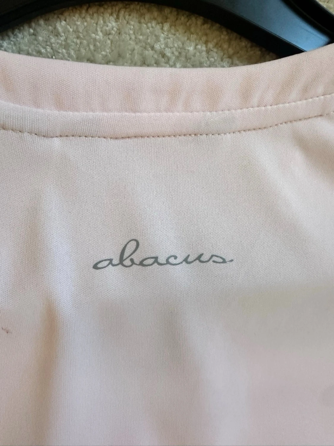 ljusrosa golftröja från Abacus - 2