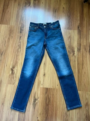 Jack and Jones jeans  - Blå jeans från Jack and Jones i storlek 164. Modell Slim glenn. Helt nya. 