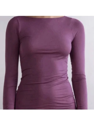 Lila Intimissimi  - Snygg lila långärmad Intimissimi topp med rund halsringning. Toppen är figurnära och tillverkad i mjuk bomull. Dem har ett litet på baksidan av toppen men som knappt är synligt och är lite nopprig på vissa ställen (bara att fråga om bild) 