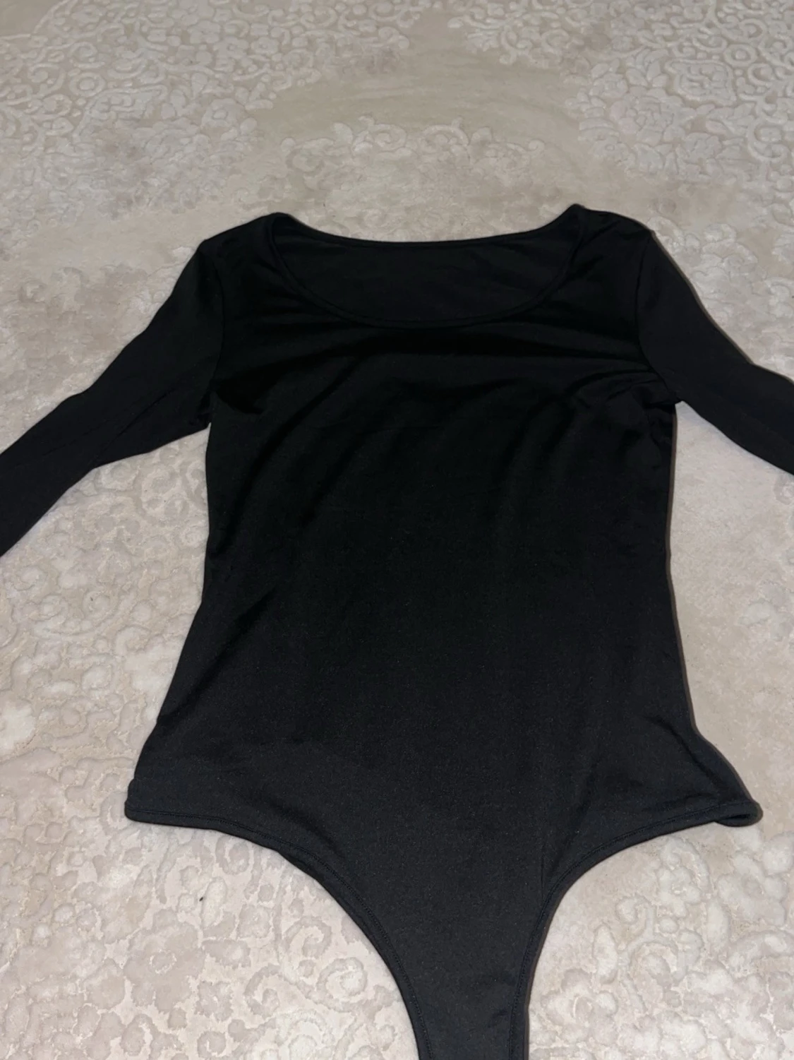 Svart långärmad body