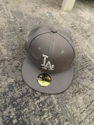 Grå la keps - Grå la keps perfekt för sommaren 