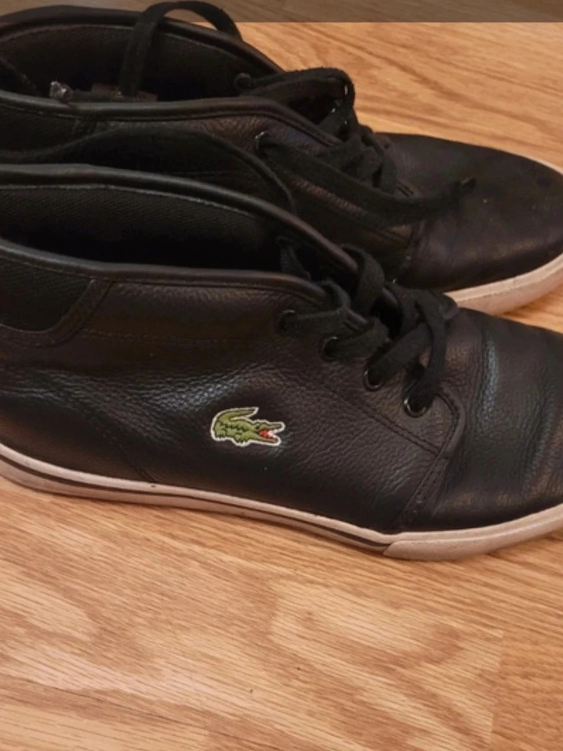 Svarta Lacoste sneakers i läder - 1