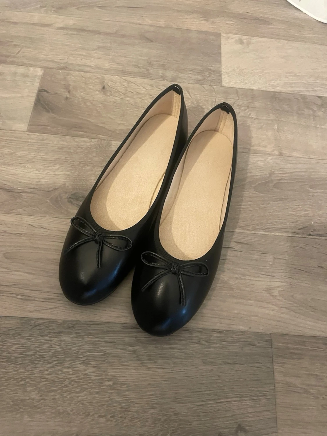 Svarta ballerinaskor med rosett