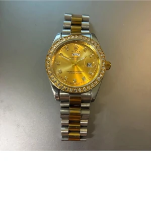 Guld silver klocka - Kom med bud snab afär pris kan diskuteras!