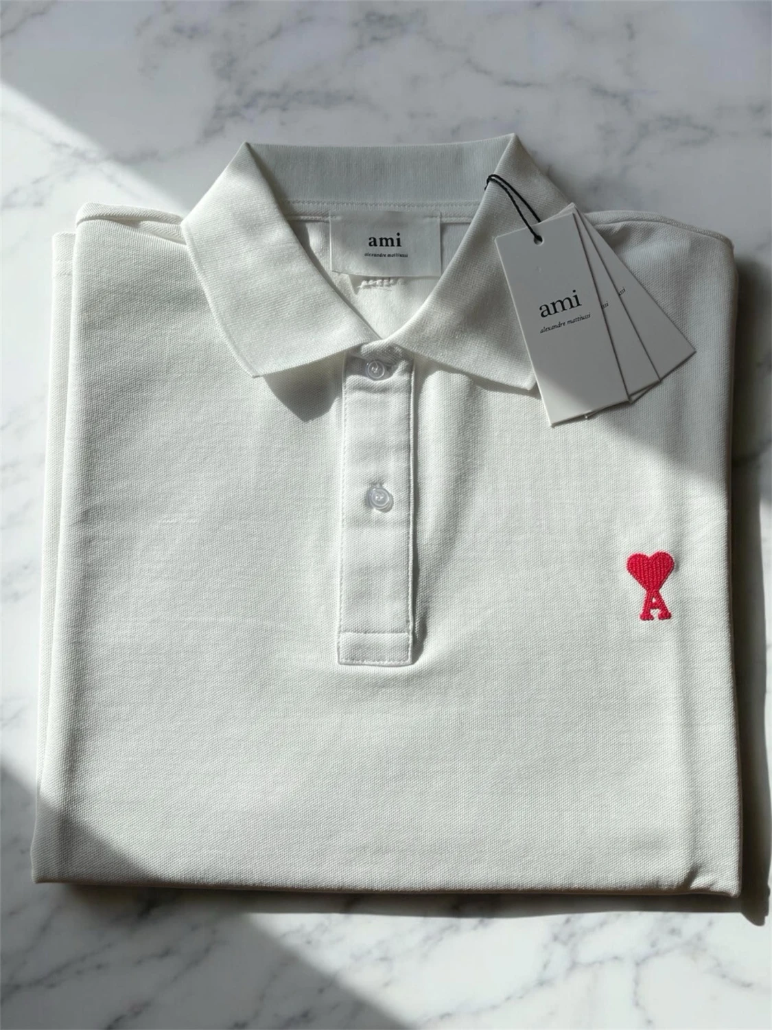 Vit pikétröja från Ami