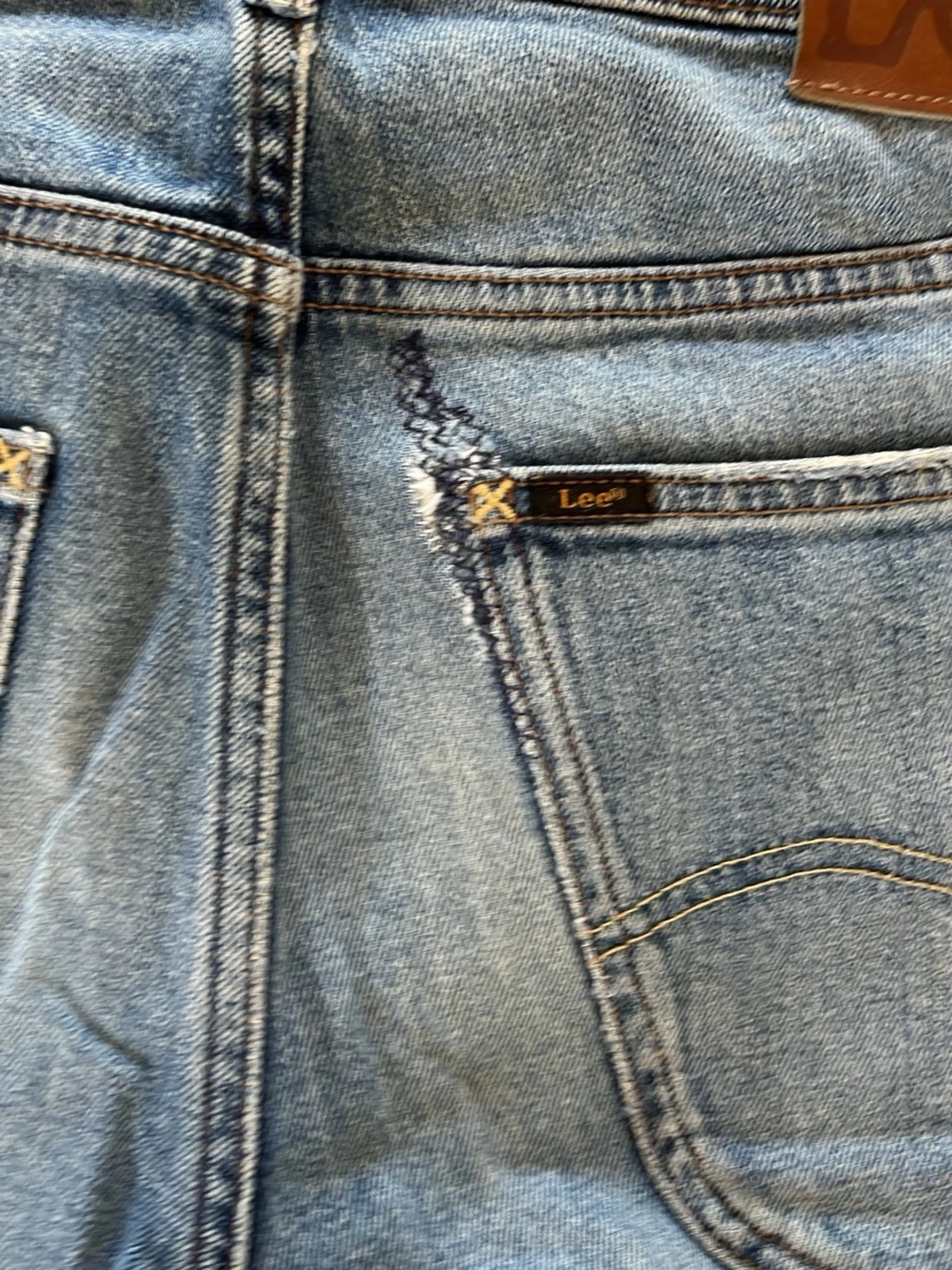 Blå raka jeans med slitningar - 2