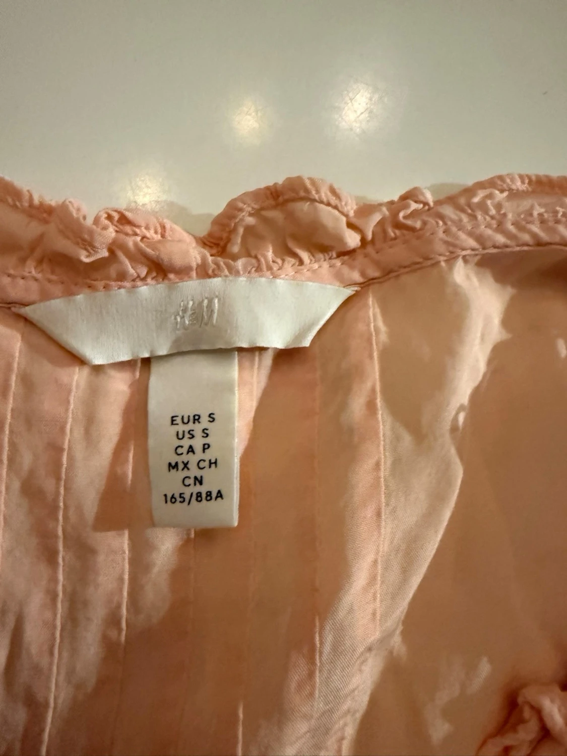 Persikofärgad blus med volanger H&M - 1