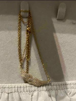 Guld vinge halsband  - Helt nytt 