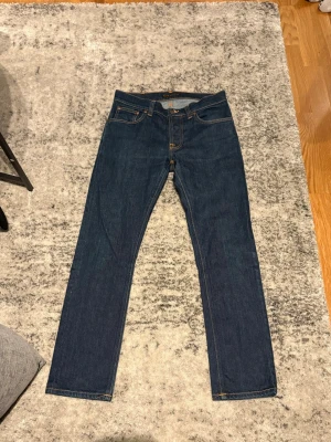 Nudie jeans grim tim dry open - Modell| grim tim dry open| storlek 31-30| skick 10/10| Pm för mer info!