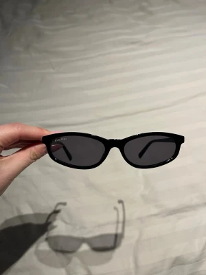 Solglasögon  - Använda en gång