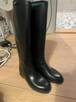 Rid stövlar - Förhandla pris