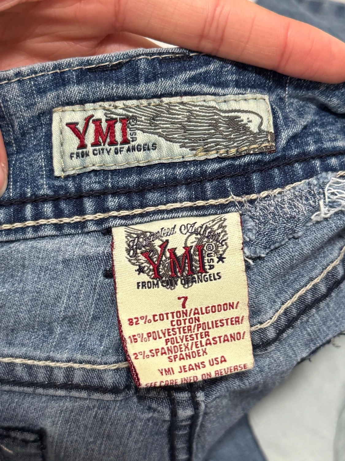 Low bootcut jeans med slitningar  - 5
