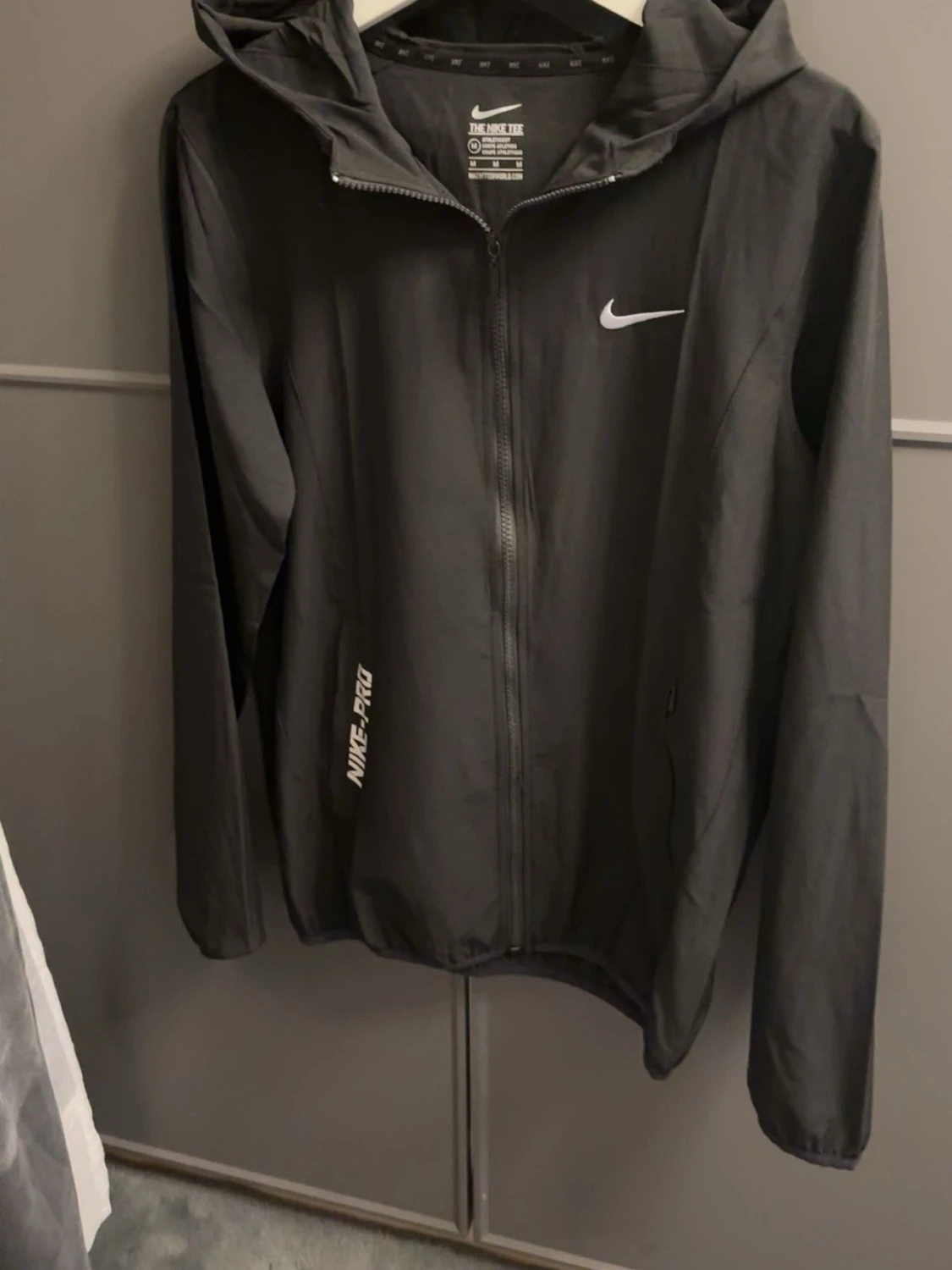 Svart Nike windbrake