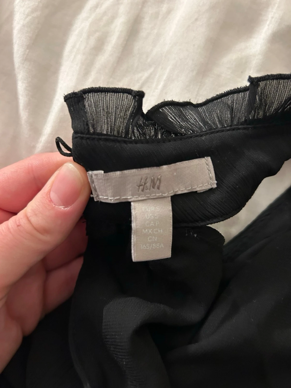 Svart axelbandslös tubtopp från H&M - 1