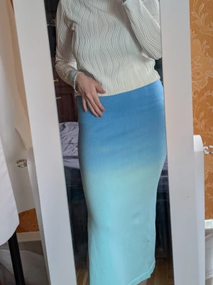 The Frolic Blue Ombre Knitted Maxi Skirt - Size 36 - Super cute and summery skirt from brand The Frolic/Asos. In bright blue, turquoise ombre fade design. Very soft knitted material, elasticated waist, side split. Regular fit, size 36/S.  In perfect condition.  Message me if you have any questions 🤍  Check out my other listings 🌿