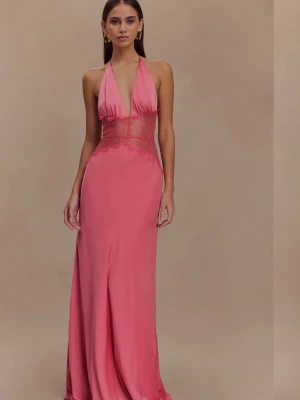 Rosa maxiklänning med spetsdetaljer - Snygg rosa maxiklänning från meshki, helt oanvänd, har bara provat den en gång. Prislappen och förpackningen kvar. Klänningen har transparenta spetsdetaljer runt midjan och en slank siluett som faller mjukt. Perfekt för dig som vill sticka ut med en elegant och modern look. Orginalplriset var 1500 kronor