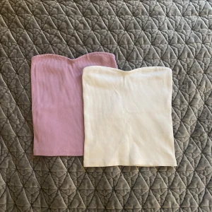 Tube top - Den lila toppen FINNS KVAR men har lagt ut i en annan annons ❤️ Två tube toppar från Gina💕 Den lila är helt oanvänd och den vita är använd bara någon gång. Köptes för 129kr/st. Säljer en för 50 och båda för 70kr men priset kan diskuteras❤️
