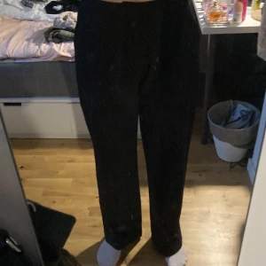 Kostymbyxor - Högmidgade kostymbyxor 