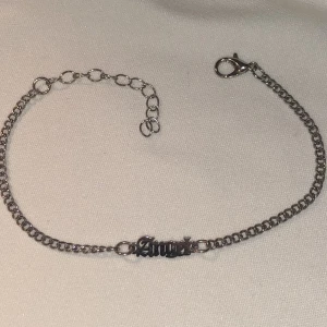 Armband  - Längd ca 23cm. Ca 2g.