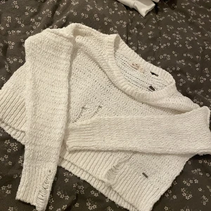 Stickad tröja - Stickad tröja från hollister Kort modell