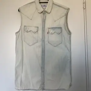 Nice denim vest, size S but suits as M too 