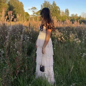 Dress  - Size 36EU (S) can fit size 38 or 34 as well.  Only worn once for a photoshoot :) 