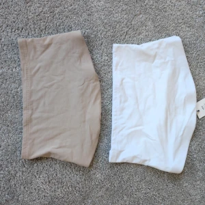 Tubtoppar  - Två oanvända tubtoppar. Den vita har prislappen kvar  Djurfrit hus