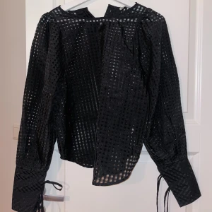 Rutig blus - Rutig blus / skjorta från Nelly. Använd för fotografering. Passar S/M