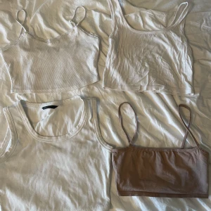 Toppar - 4 toppar. Lite noppriga och urtvättade. 10 kr st och 30 kr för alla fyra