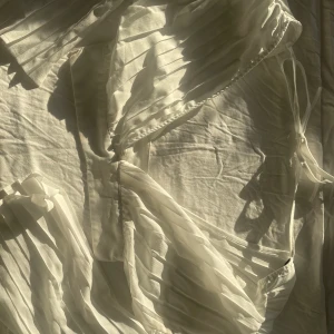 Långärmad kort blus - Använd en gång