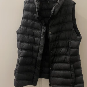 svart väst - Storlek M Dam