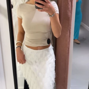 Topp  - Topp från gina med öppen rygg. As snygg och har en super bra passform.   Storlek xxs har den storleken pga ville att den skulle sitta snyggare. Men passar S