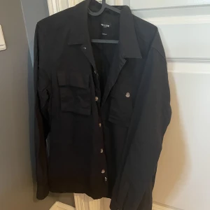 Overshirt - Köparen står för frakt 