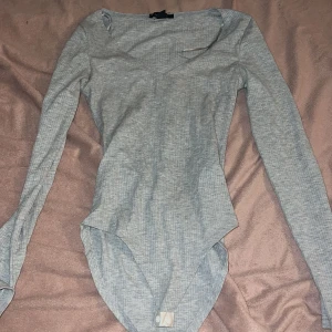 Urringad  body - Snygg och tajt body