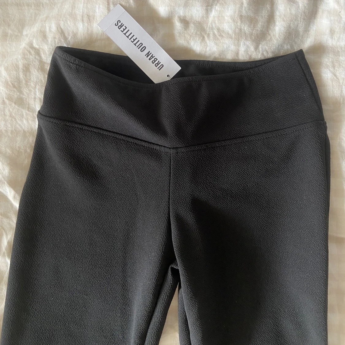 Lågmidjade utsvängda byxor  - 91