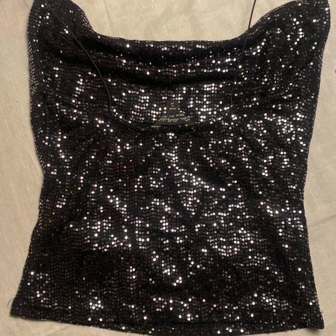 Glittrigt linne - 91