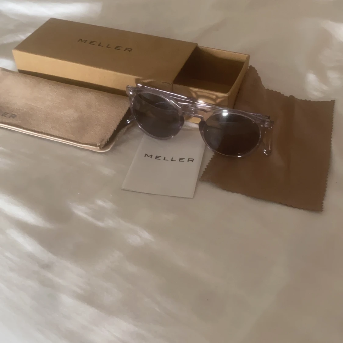 Meller solglasögon
