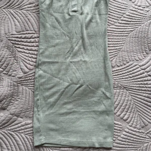 Ljusgrön klänning - Bodycon klänning som är använd 1 gång. Den har bra med stretch och sitter fint på kroppen. 