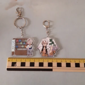 2st Sanemi Shinazugawa keychains - I really dont want to sell them but i need money:/ Bought for 75-100kr each on a con. Barley used and are in the condition i bought them in. The left one-5.5×4.5cm right one-3/6×5cm. Contact me if u have any questions!
