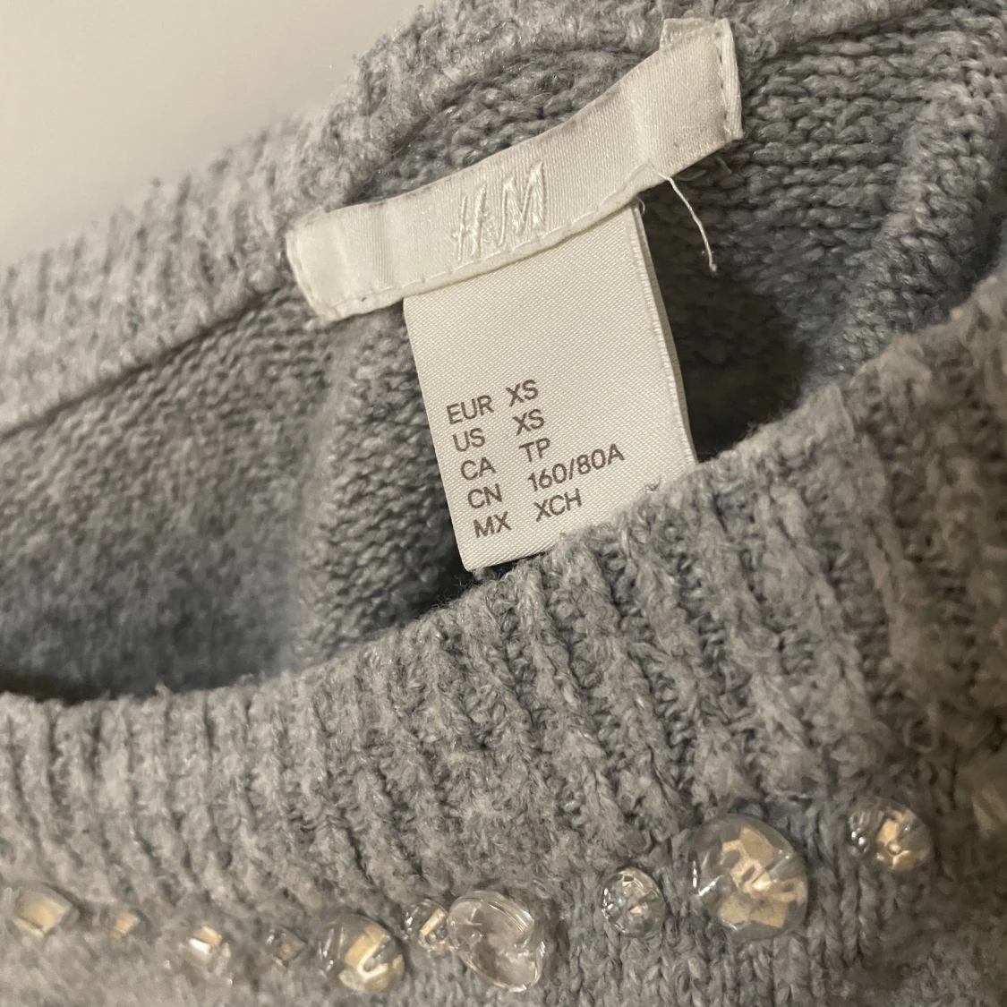 Grå stickad tröja  - 90