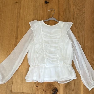 Tröja  - Storlek 146 